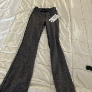 Brand new, with tags, lululemon groove pant SHR flare *nulu. Size 4